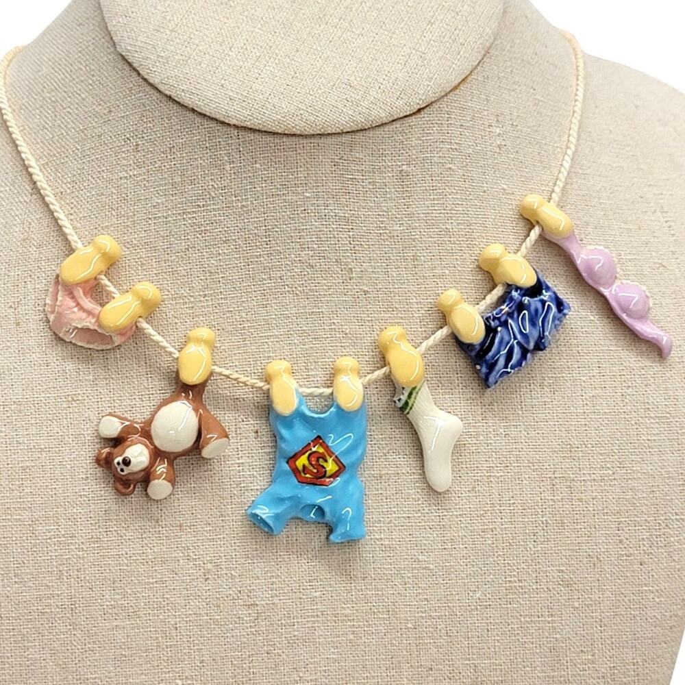 Vintage 1980 Daina Ceramic Clothesline Laundry Charm Novelty Cord Necklace